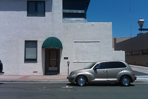 Our new front door and someone's sweet PT Bruiser with moon hub caps {sic}